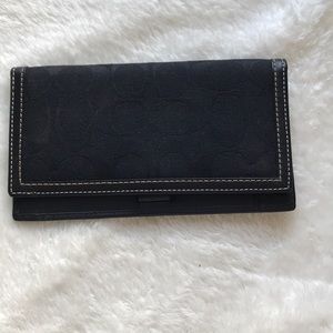 Black coach checkbook cover